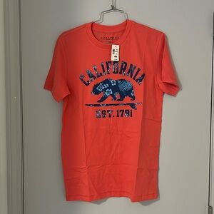 Aeropostale men graphic tee, size small and coral color. New with tags.